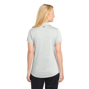 Back of woman wearing grey polo with Insideya Golf icon