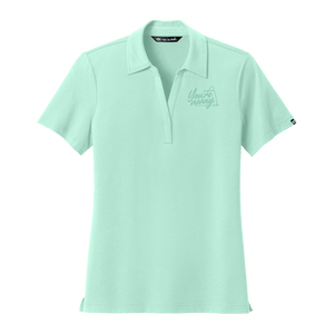 Women's TravisMathew mint polo with Insideya Golf tagline on left chest