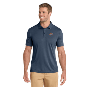 Model wearing dark blue TravisMathew polo with Insideya Golf icon on left chest