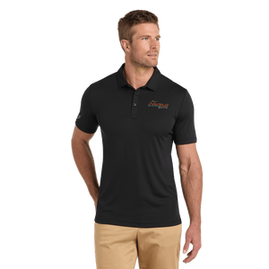Model wearing black TravisMathew polo with Insideya Golf logo on left chest and right sleeve