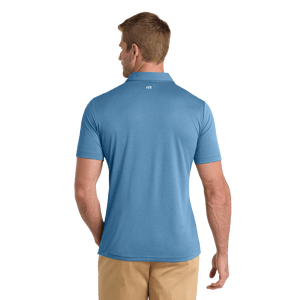Federal Blue TravisMathew Coto Performance Polo with embroidered Insideya Golf logo on left chest back model