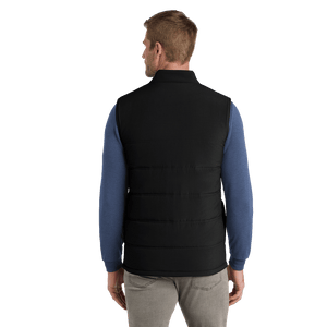 Back of model wearing black vest