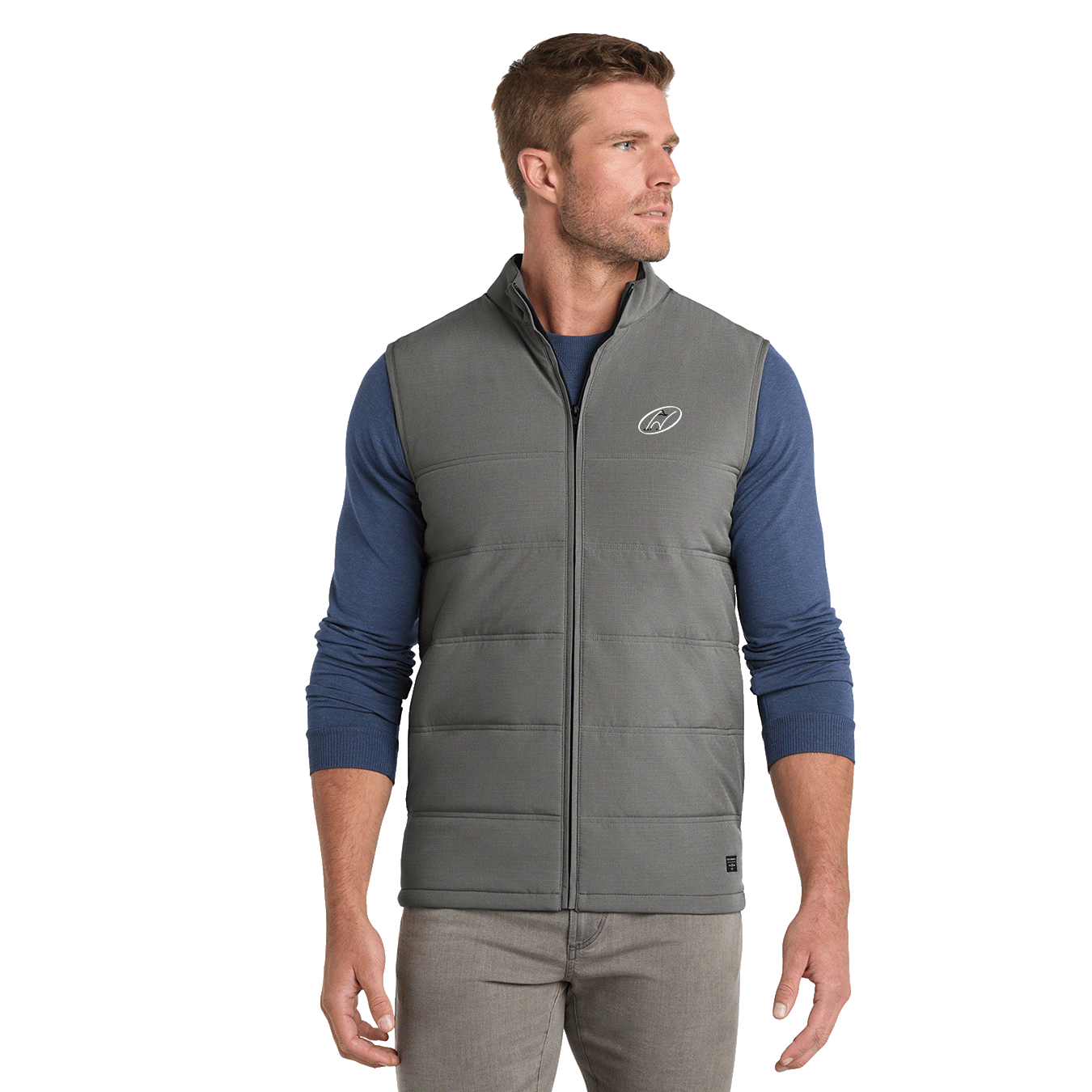 Model wearing grey TravisMathew vest with Insideya Golf icon on left chest